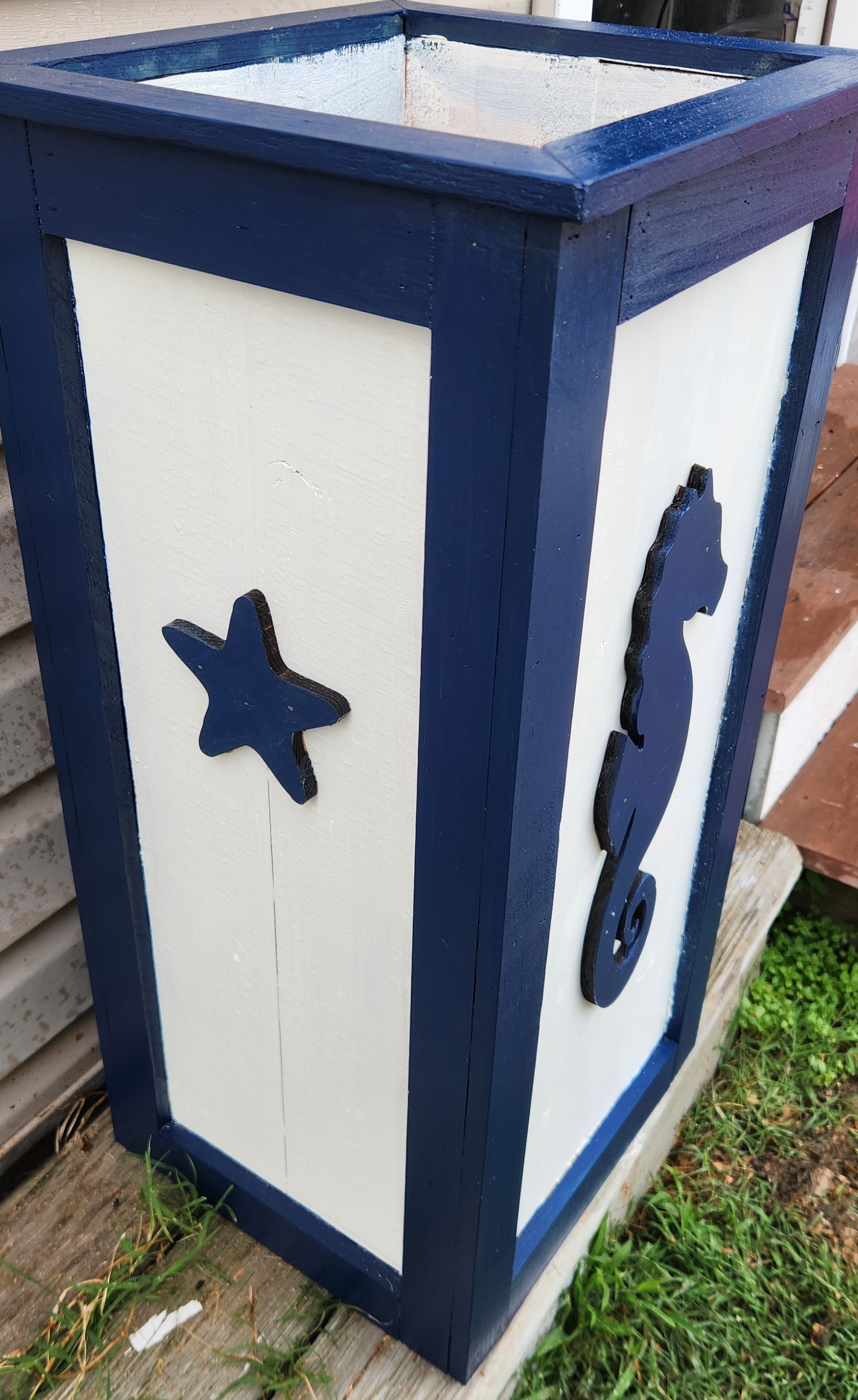 Left side of our Seahorse Tall Boy 28.5"H x 14 Square top, Exterior stained and Custom Cutouts attached